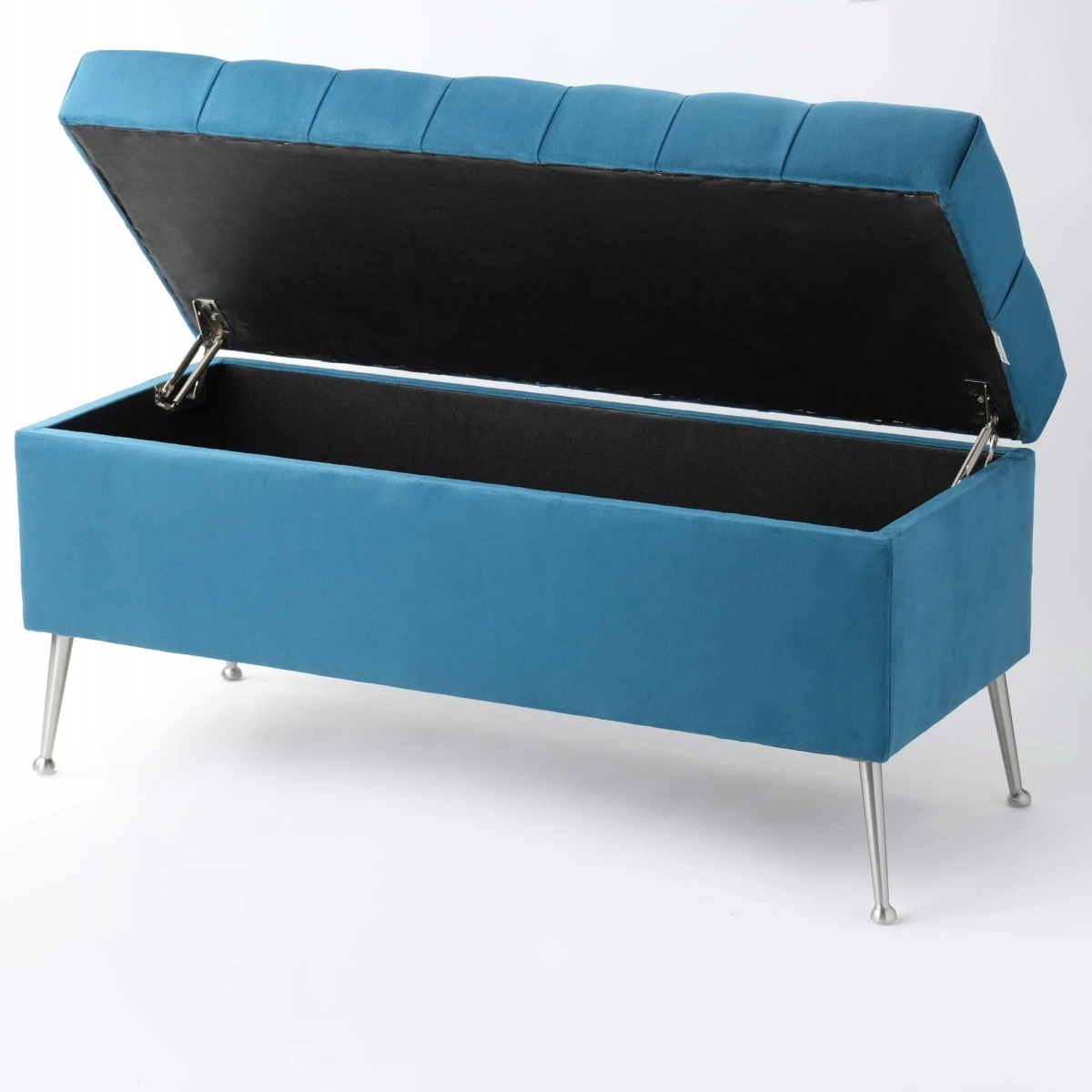 Elegante pouf trapuntato con contenitore in blu su gambe sottili