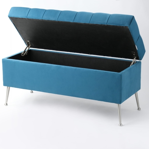 Elegante pouf trapuntato con contenitore in blu su gambe sottili