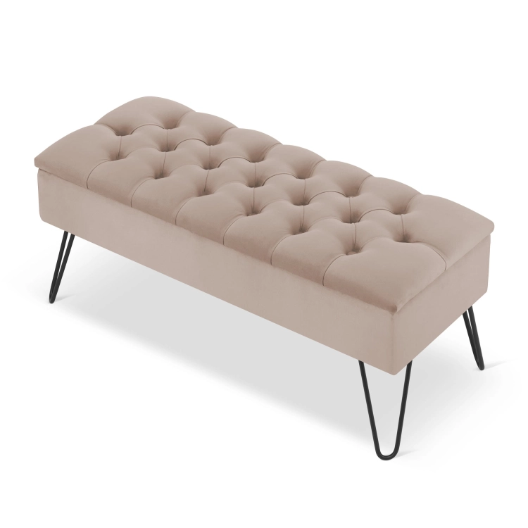 Comodo pouf latte trapuntato con gambe a spillo