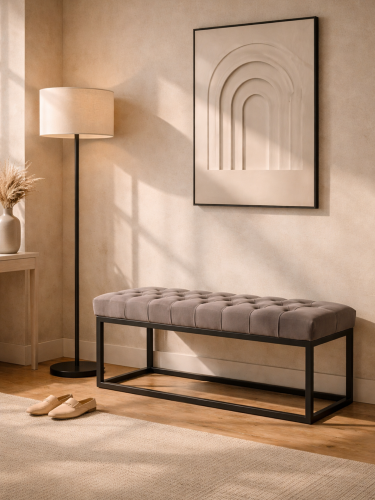 Gesteppte Bank in Grau auf Metallbeinen