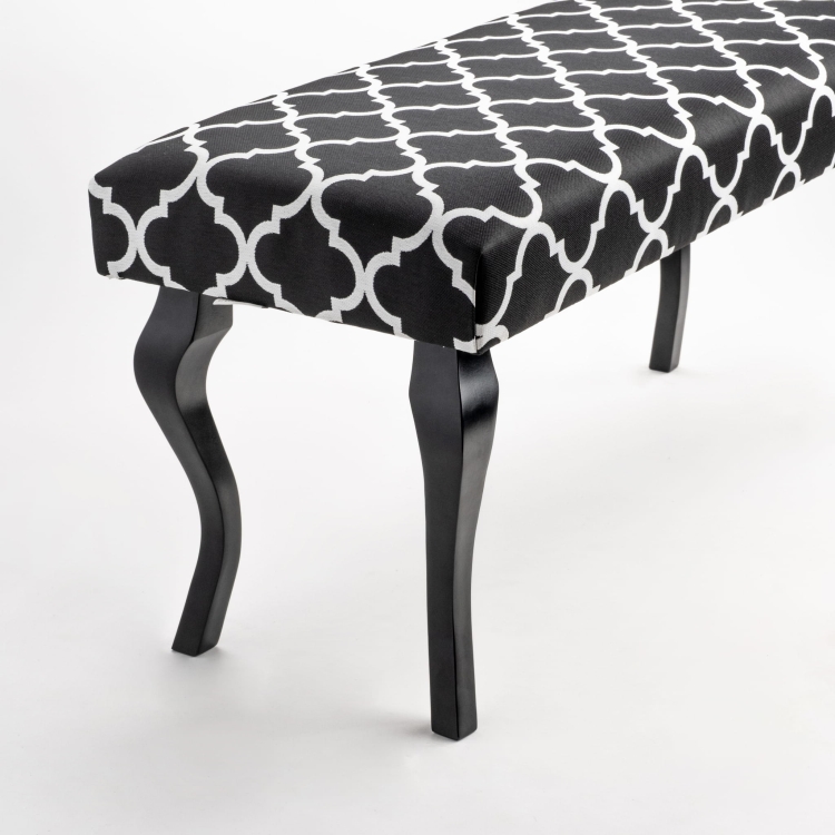 Panca con motivo a seduta imbottita e gambe in legno nero