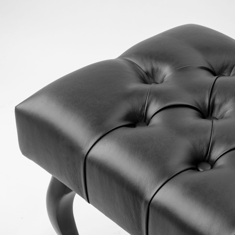 Elegante panca in pelle trapuntata nera