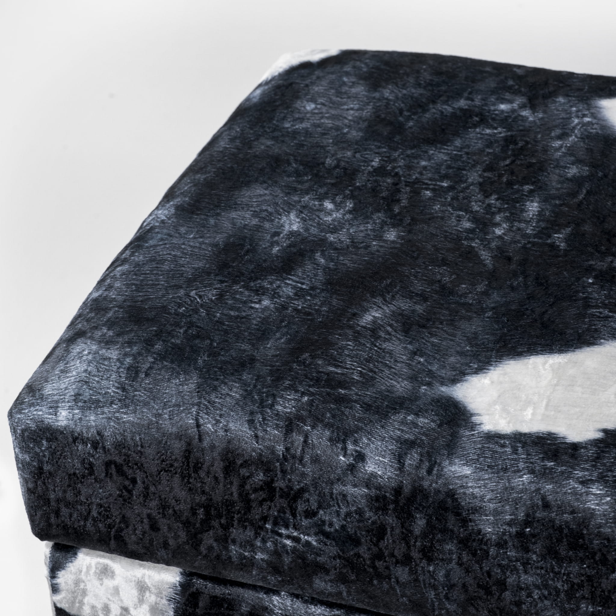 Pouf contenitore con rivestimento in pelle di mucca